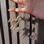 ⁦Alphabet gold stras Necklace⁩ - الصورة ⁦2⁩